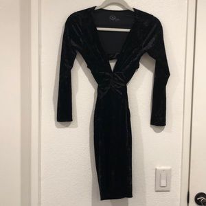 Black velvet plunge neck dress.